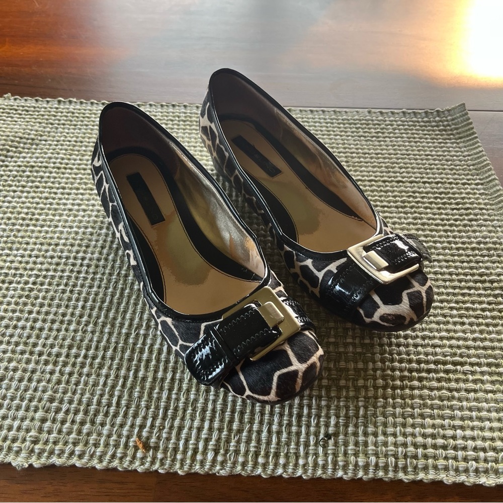 Bandolino shoes, animal print, black, size 8.5, good condition. Flats.